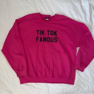 Vivid Pink Crew Neck Pullover With  “TikTok Famous” Black Text